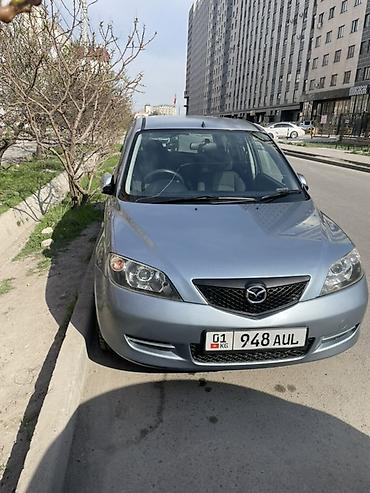 е 210: Mazda Demio: 2004 г., Автомат, Бензин, Хэтчбэк — 5