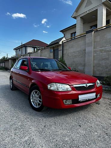 Mazda 323: 1999 г., 1.8 л, Автомат, Бензин, Хетчбек