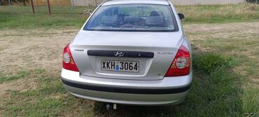 Hyundai Elantra: 1.6 l | 2004 year Limousine