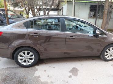 Kia: Kia Rio: 1.4 l | 2013 il Krossover — 4