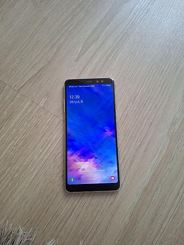 телефон fly fs520 selfie 1: Samsung Galaxy A8 2018, цвет - Голубой, Две SIM карты — 1