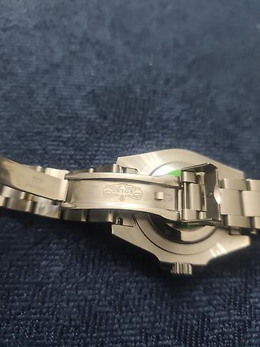 agli saat: Rolex Submariner Date “Hulk” (yaşıl çərçivə və yaşıl siferblat) — 2