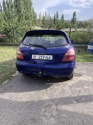 салон для машины: Nissan Almera: 2003 г., 1.5 л, Механика, Бензин, Хэтчбэк — 10