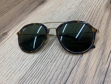 Очки: Солнцезащитные очки Ray-Ban в круглой оправе. Модель выполнена в — 1