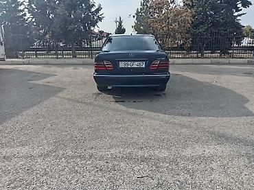 quba teker: Mercedes-Benz E-Class (W210) sedan - Kuzov: 4 qapılı sedan, tünd mavi — 5