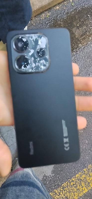 Məhsul: Smartfon - Korpus: Mat qara arxa panel, düzbucaqlı kamera