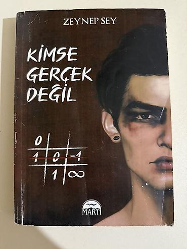 Bədii ədəbiyyat: Kimse Gerçek Değil . Cildli deyil, pirat kitabdır. 5 AZN satılır. Bəzi — 1