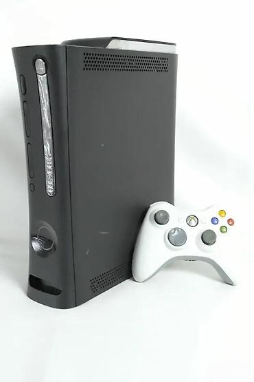 Ostale igre i konzole: U ponudi XBOX 360. Konzola je vrlo korektno očuvana sa malim znakovima — 13