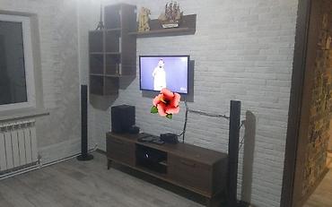 televizor alti alçıpan: Tv stenti polkalı — 1
