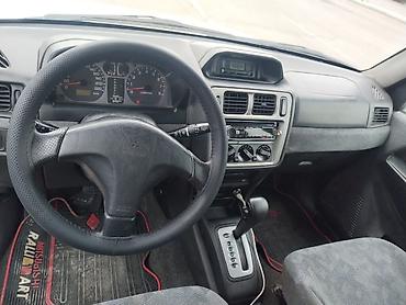 Mitsubishi Pajero iO 4WD kompakt yolsuzluq avtomobili. Avtomobilin at lalafo.az — 2 Mitsubishi Pajero iO 4WD kompakt yolsuzluq avtomobili. Avtomobilin — 2
