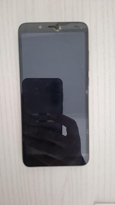 кызыл бирдик: Redmi, Redmi 7A, Колдонулган, 32 ГБ, түсү - Кара, 2 SIM — 1