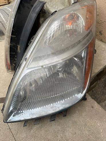 Digər nəqliyyat: Prius faralari bir terefin ust susesi qiriqdi umumiyetle faralarda is — 1