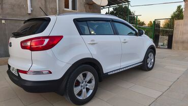 Kia: Kia Sportage: 2.4 l | 2011 il Sedan — 9