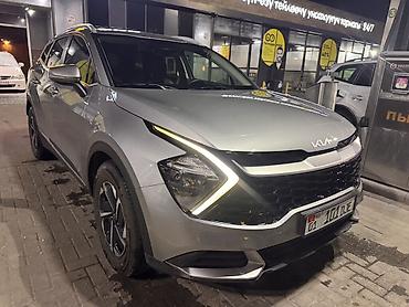 салон машины: Kia Sportage: 2022 г., 1.6 л, Автомат, Гибрид, Кроссовер — 2