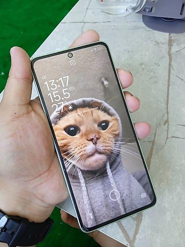 Другие мобильные телефоны: Redmi Note 13 Смартфон в мятно‑зеленом цвете с плоскими гранями и — 6