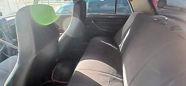 VAZ (LADA): VAZ 2107 sedan Xüsusiyyətlər: - Kuzov: 4 qapılı sedan, ağ rəng - — 5