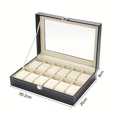 Наручные часы: 12 bölməli lüks saat qutusu . ENDIRIM EDILƏCƏK. Material: Premium PU — 2