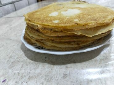 Мясная и рыбная продукция: Bilincik. Hər biri qızılı rəngdə, incə və yumşaq teksturalı blinlər