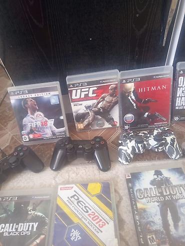 PS3 (Sony PlayStation 3): Игровая консоль Sony PlayStation 3 (модель Slim) с набором дисков — 6