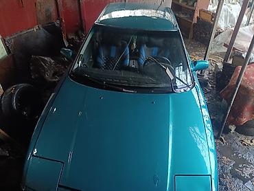 mazda d: Mazda 323: 1991 г., Хэтчбэк — 1