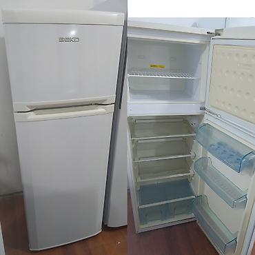 siyuducu: İşlənmiş 2 qapılı Beko Soyuducu Satılır, rəng - Ağ, Təkərli — 1