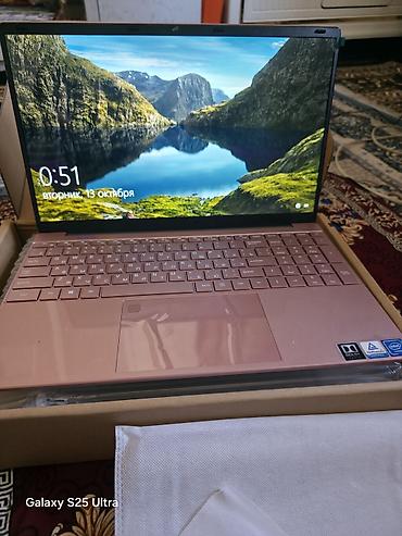 Ноутбуки Microsoft: Ноутбук в тонком корпусе розового цвета с большим экраном и — 1