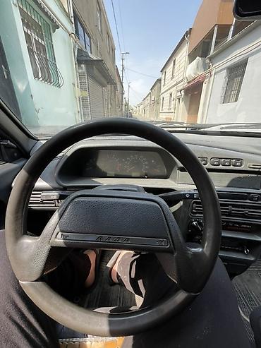 tap az vaz 2107: VAZ 2115 avtomobili, gümüşü rəngdə sedan kuzovlu modeldir. Şəkillərdə — 4