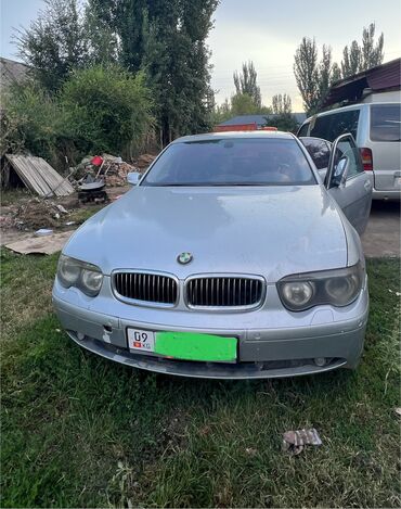 кредит на машину: Автомобиль BMW 7-й серии в серебристом цвете, модель E65/ надо делать