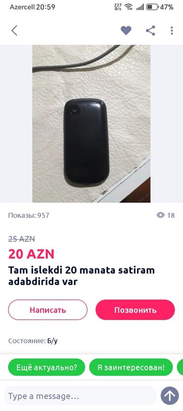 smartfon telefonlar: Qara rəngdə, yığcam dizaynlı mobil telefon. Arxa tərəfində kamera var