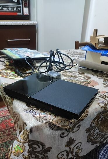Nintendo Switch: Sony PlayStation 2 Slim (PS2) oyun konsolu Xüsusiyyətlər və tərkib: -