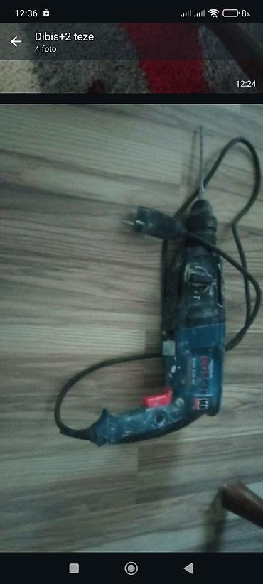 Bosch elektrikli perforator / zərbə funksiyalı qazma aləti. Görüntüdə