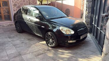 Hyundai: Hyundai Accent: 1.4 l | 2009 il Sedan — 2