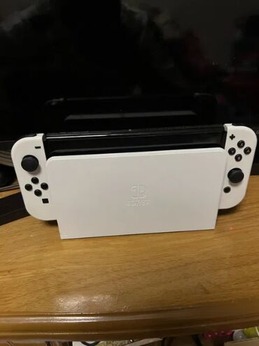 нинтендо свитч купить бишкек: Продаётся Nintendo Switch OLED. Состояние отличное, консоль не