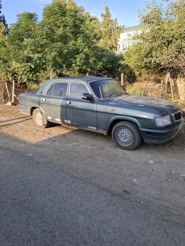 фольксваген поло новый кузов комплектации и цены: GAZ Volga 3110 sedan - Korpus: 4 qapılı, tünd yaşıl rəng, arxa və yan