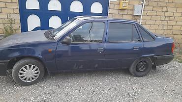 Daewoo: Daewoo Racer sedan - Kuzov: 4 qapılı sedan, tünd mavi rəng - Mator və — 2