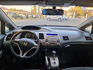 тормозные суппорта: Honda Civic: 2009 г., 1.3 л, Вариатор, Гибрид, Седан — 8