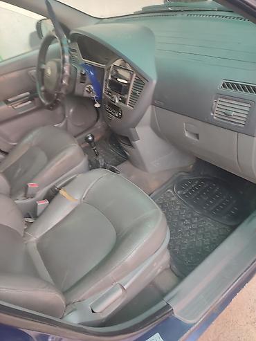 ключи б у: Kia Carens: 2004 г., 1.7 л, Механика, Бензин, Минивэн — 4