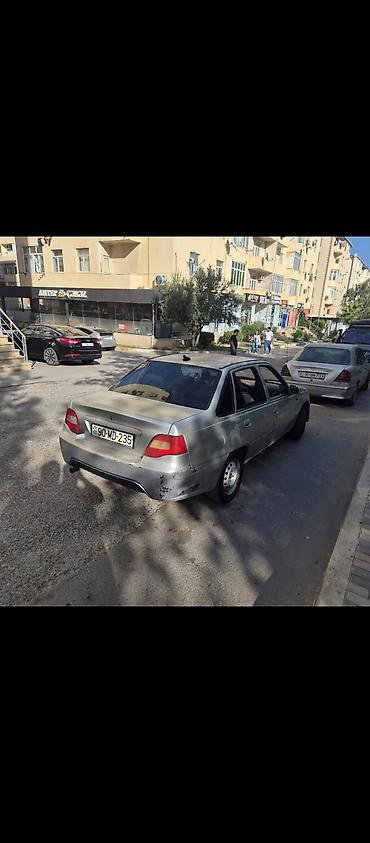 Daewoo: Daewoo Nexia, sedan, gümüşü rəng. - Yanacaq: benzin - Sürətlər qutusu — 4