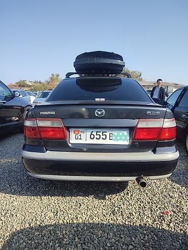 супер маз 5551: Mazda 626: 1999 г., 1.8 л, Механика, Бензин, Седан — 3