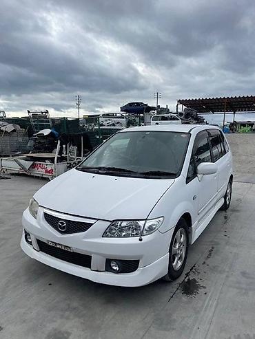 mazda 2000: Крыло Переднее правое Mazda, 2002 г., Б/у, Оригинал — 2