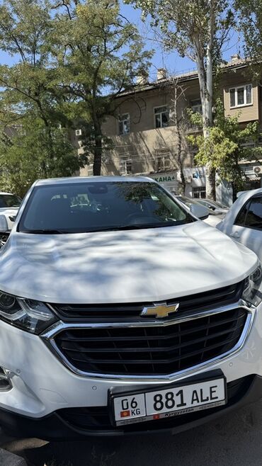 купить передние тормозные диски: Белый кроссовер Chevrolet Equinox, демонстрирующий современный дизайн