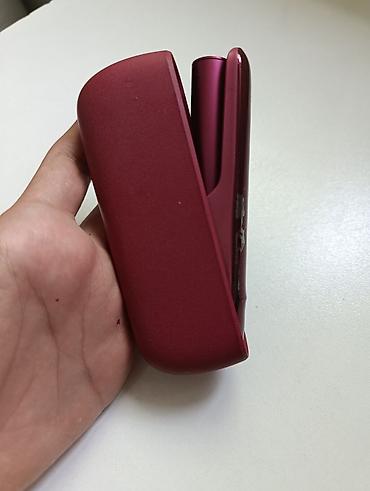 meta eynek: IQOS elektron tütün cihazı – qırmızı (bordo) rəngdə. Xüsusiyyətlər: - — 3