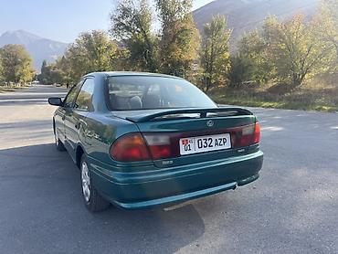 плуг для мтз трактора: Mazda 323: 1997 г., Механика, Бензин, Седан — 4