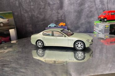 Avtomobil modelləri: Коллекционная модель Maserati Quattroporte V light green 2005 — 6