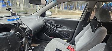 daewoo damas kredit: Daewoo Leganza: 2 l | 1998 il Sedan — 8
