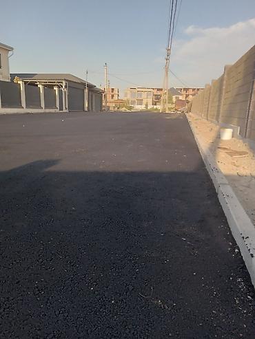 Коммунальная и дорожная техника: Услуги по укладке асфальта для создания прочных и долговечных дорожных — 1