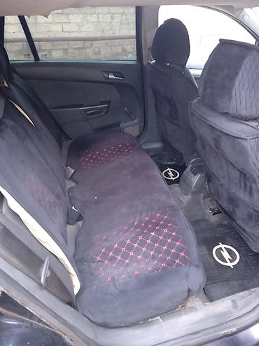Opel: Opel Astra H Caravan (Universal) – qara rəng, salon və yük yeri geniş — 5