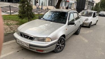 обмен нексия 1: Автомобиль Daewoo Nexia серебристого цвета, представленный в кузове