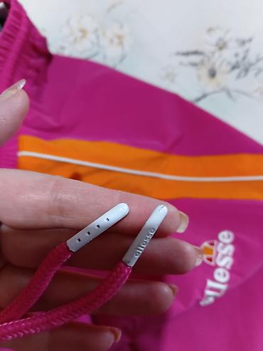 Donji deo: Ellesse ženske trenerke/pantalone - Model: SGEQ 8451 (etiketa SS020) — 10