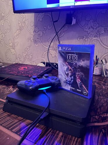 PS4 (Sony Playstation 4): Playstation 4 slim. Ideal veziyyetde. Temirde olmayib. Ustunde 1
